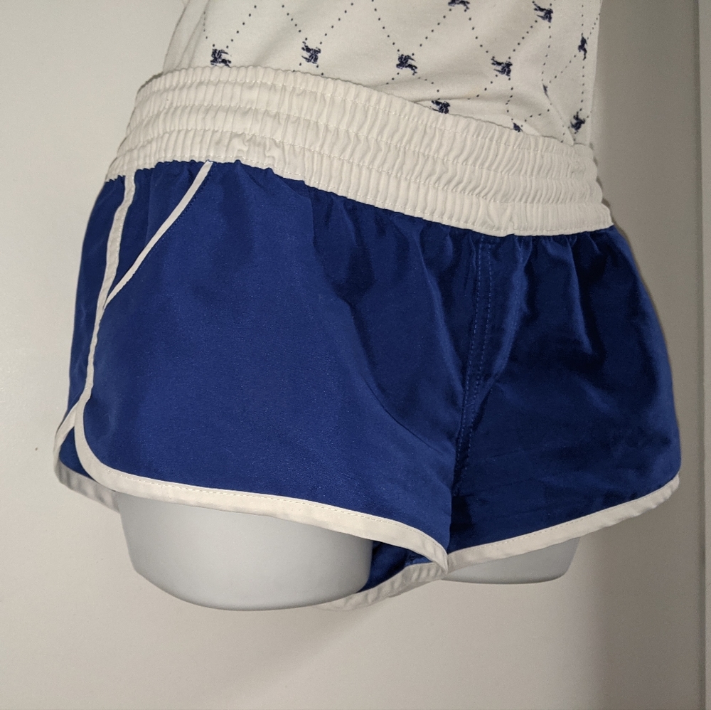 5/$25 Blue dolphin shorts white trim and with pockets